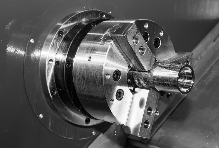 Rotating,Shiny,Metal,Part,Of,The,Cnc,Lathe